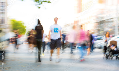  Blurred image of people walking in the Knightsbridge. Modern life concept London, UK