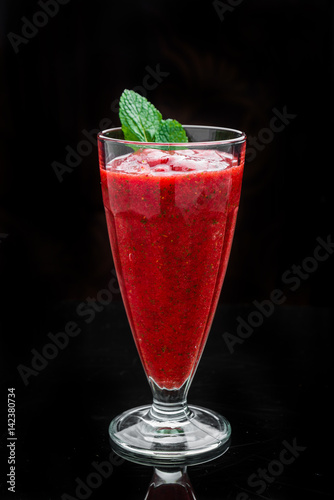 Strawberry raspberry cocktail with ice photo