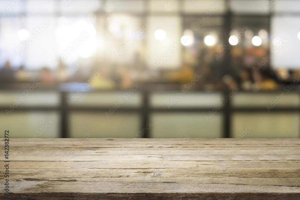 Business empty wooden table for present product on coffee shop. Business empty wooden table for present product on coffee shop.