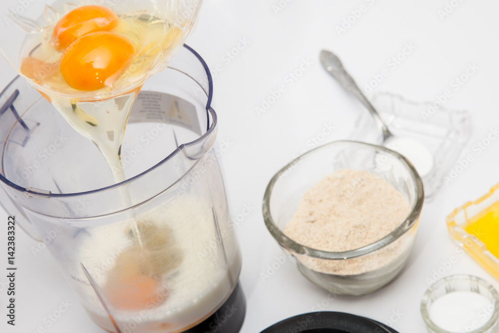 Quinoa crepes preparation : Quinoa crepes mix - Adding eggs Quinoa crepes preparation : Quinoa crepes mix - Adding eggs