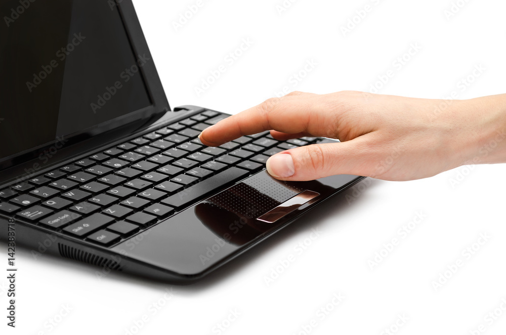 hand of girl typing on keyboard.