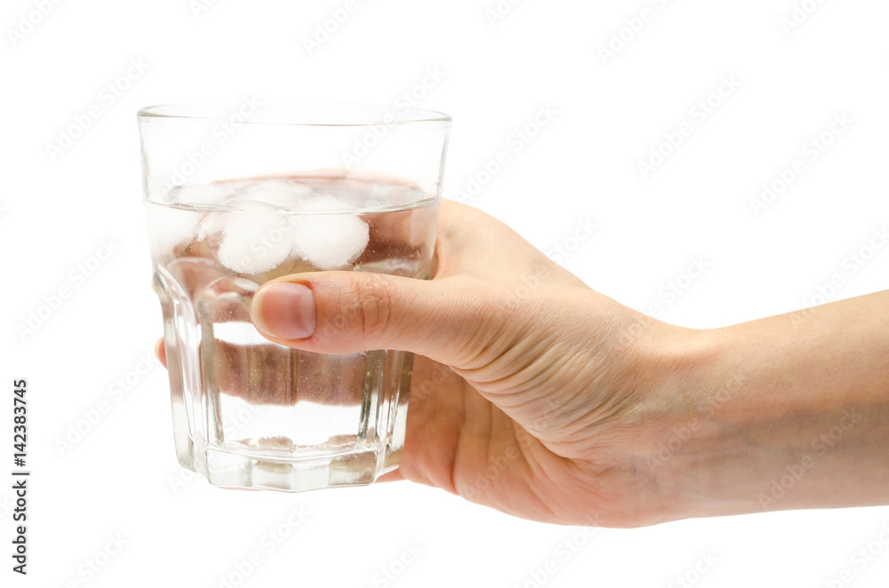 hand of girl holding glass of water hand of girl holding glass of water