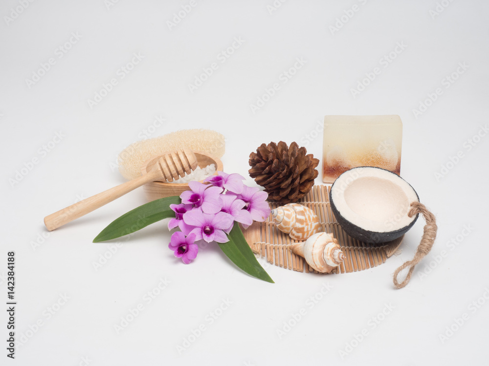 Aromatherapy  product  Spa set ,candle ,soap,coconut orchid flower,shell,  massage  with white wood  background . top view composition.