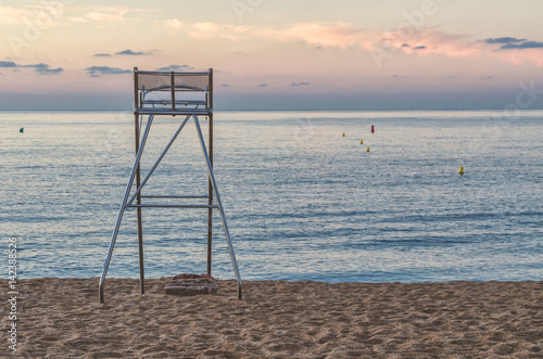Beach chair for rescuers at sunset © Alex Tor