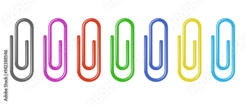 Set of colour paper clips made of shining material isolated on white background