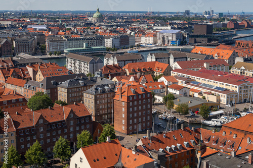 Aerial view of Copenhagen red roofs and canal. Christianshavn and central distrinct