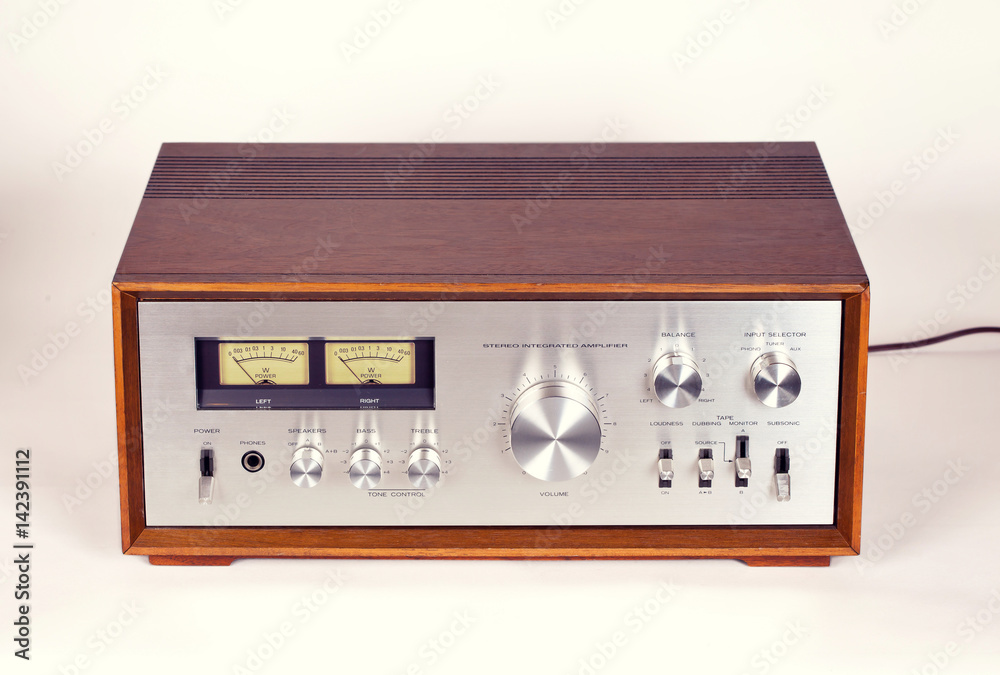 Fototapeta premium Vintage Stereo Audio Amplifier in Wooden cabinet