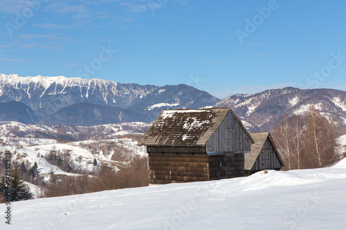 Winter in Transylvania (Romania) Old traditional countryside house in winter © Constantin