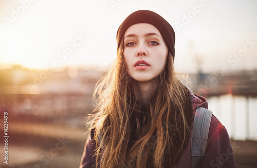 Fotografie Portrait of a hipster girl at sunset