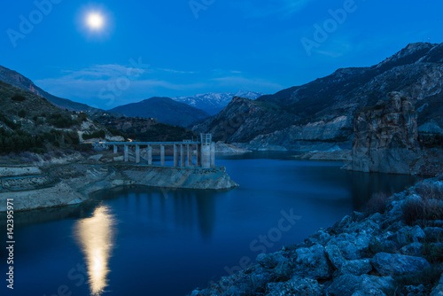 Reservoir Embalse de Canales in Granada, Spain at evening