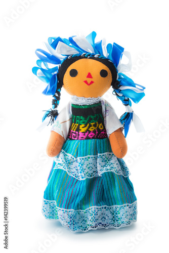 traditional handmade mexican doll isolated on white