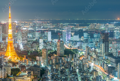 TOKYO - MAY 20, 2016: Tokyo aerial night skyline from Asakusa. The city attracts 15 million visitors every year