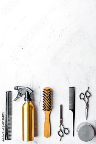 hairdressing concept with barber tools on white background top view mockup