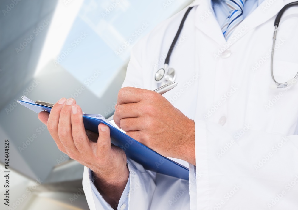 Doctor mid section with clipboard against blurry room Doctor mid section with clipboard against blurry room