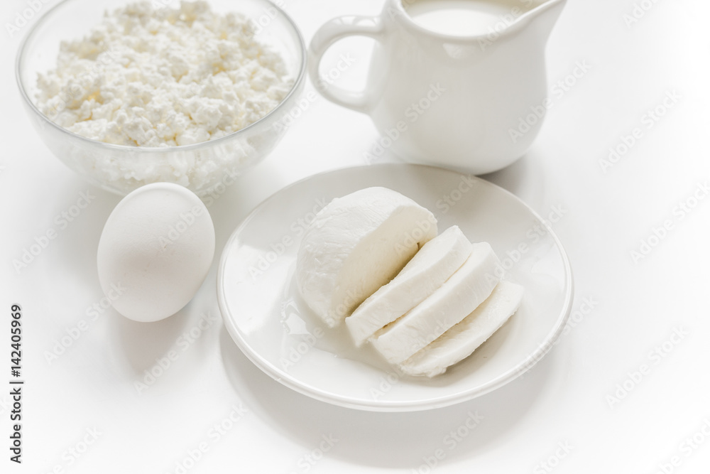 monochrome concept with dairy products on white table monochrome concept with dairy products on white table