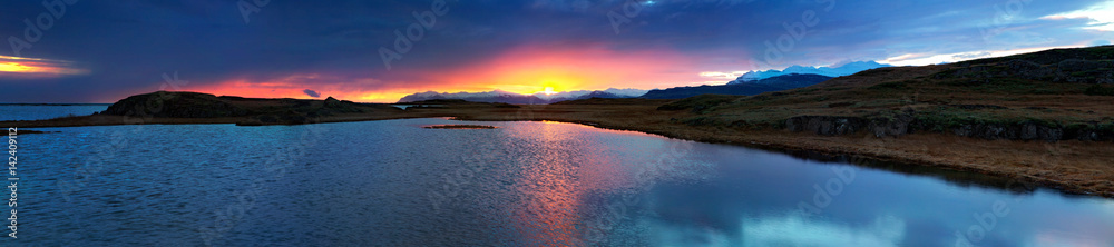 Sunset panorama on the shore nearby Djupivogur, Iceland