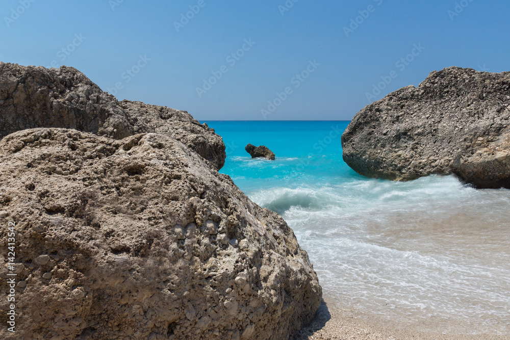 Amazing landskape of blue waters of Megali Petra Beach, Lefkada, Ionian Islands, Greece