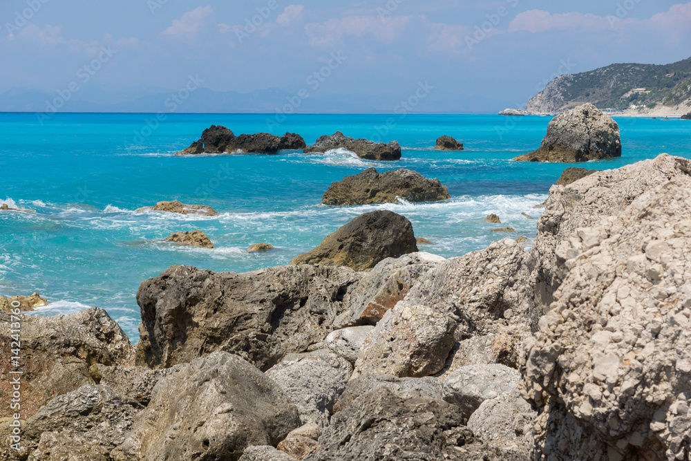 Amazing landskape of blue waters of Megali Petra Beach, Lefkada, Ionian Islands, Greece Amazing landskape of blue waters of Megali Petra Beach, Lefkada, Ionian Islands, Greece