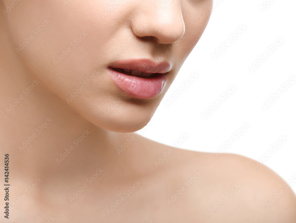 Face of young woman on white background