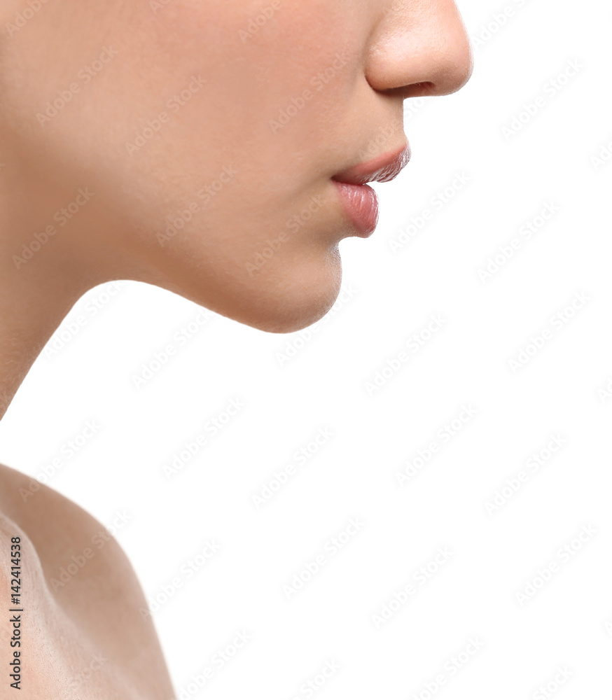 Obraz premium Face of young woman on white background