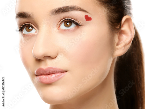 Beautiful young woman with ...