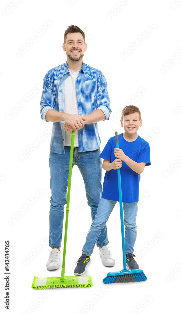 Dad and son with cleaning supplies on white background Dad and son with cleaning supplies on white background