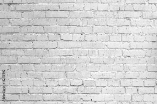 White grunge painted brick wall
