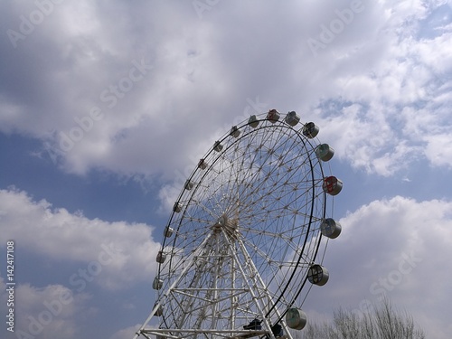 Tableau sur toile ferris wheel and cloud