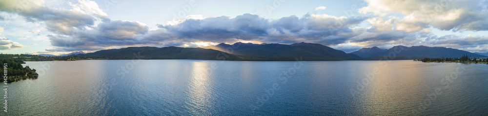Aerial view of big lake in Te Anau at sunset, New Zealand.