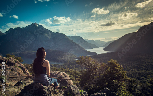 Girl meditating with a great view, Bariloche, Argentina