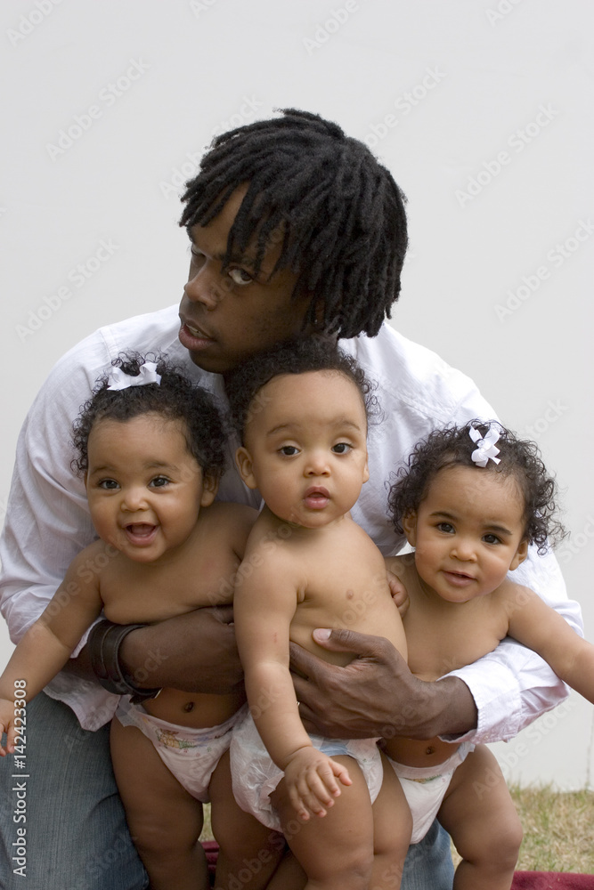 Dad with his hands full isolated on white. Dad with his hands full isolated on white.