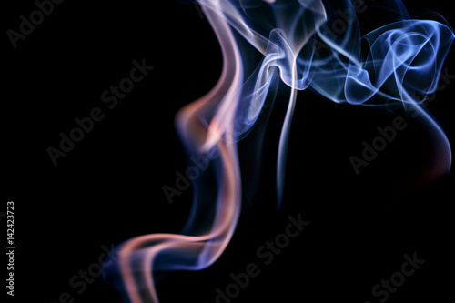 Abstract lilac blue smoke from aromatic sticks.