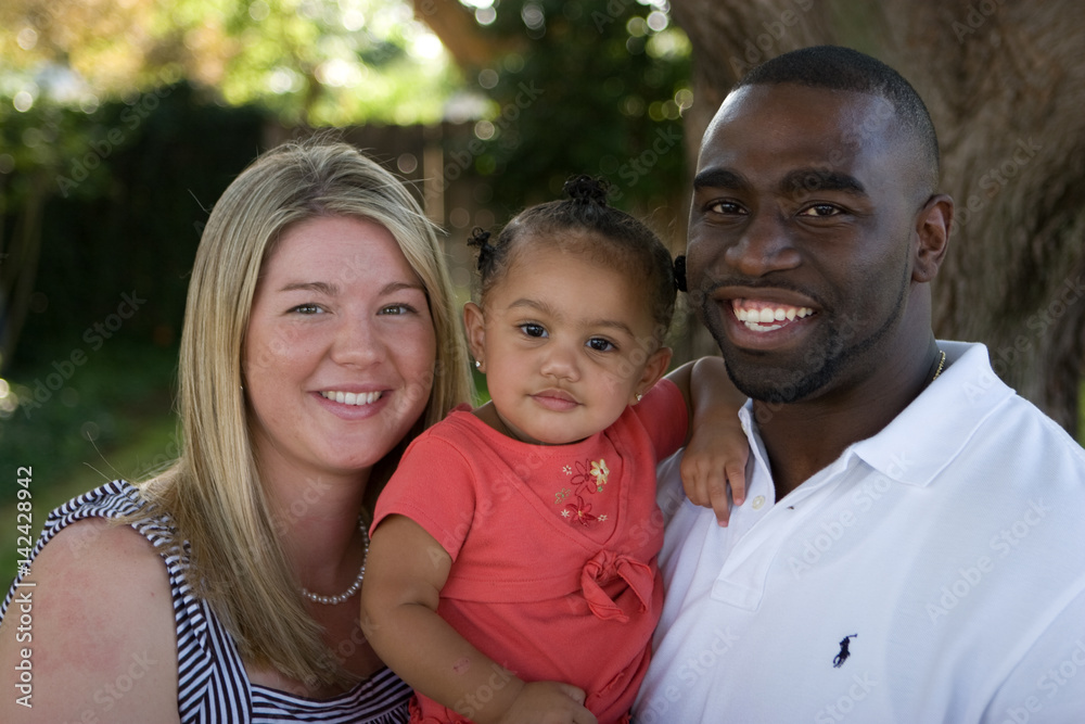 Portrait of a happy multicultural family smiling. Portrait of a happy multicultural family smiling.