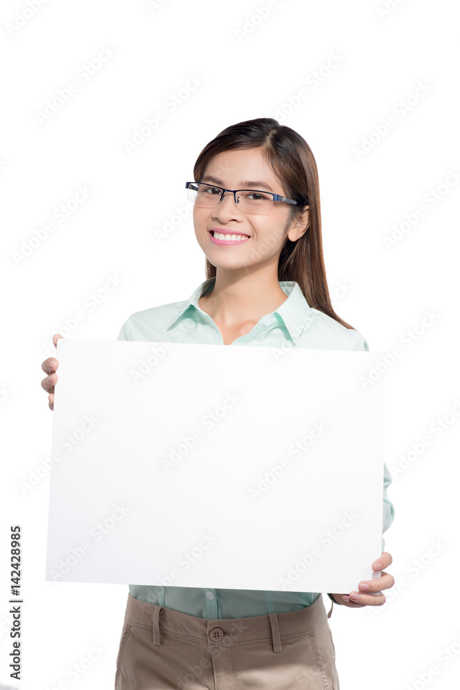 Happy young woman showing and displaying placard ready for your text Happy young woman showing and displaying placard ready for your text