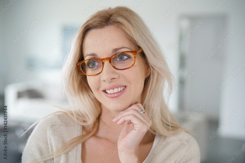 Portrait of beautiful blond woman with eyeglasses Portrait of beautiful blond woman with eyeglasses