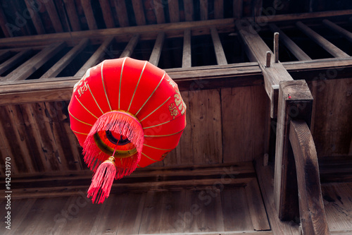 Chinese red lanterns hanging on historic building in Lishui city Zhejiang province China.