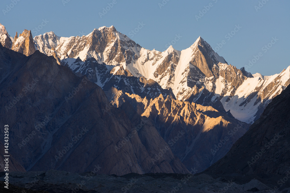 Fototapeta premium Karakorum snow mountain peaks at sunset, K2 trek, Pakistan
