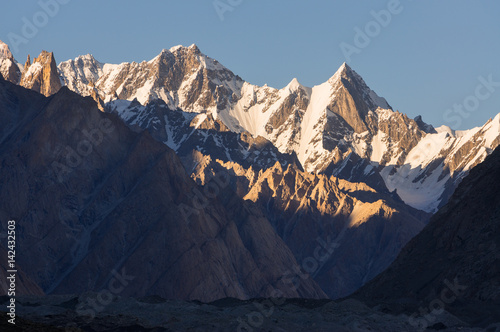 Karakorum snow mountain peaks at sunset, K2 trek, Pakistan