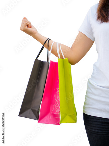 people, sale and consumerism concept - close up of woman with shopping bags on white background