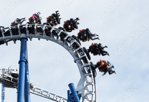 The Roller Coaster Track on background of blue sky. photo