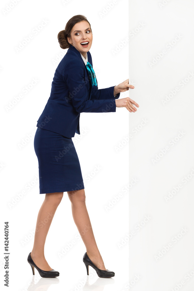 Happy Woman In Formalwear Pulling Big Banner Happy Woman In Formalwear Pulling Big Banner