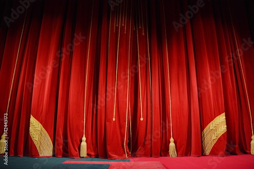 red theater curtain with gold embroidery