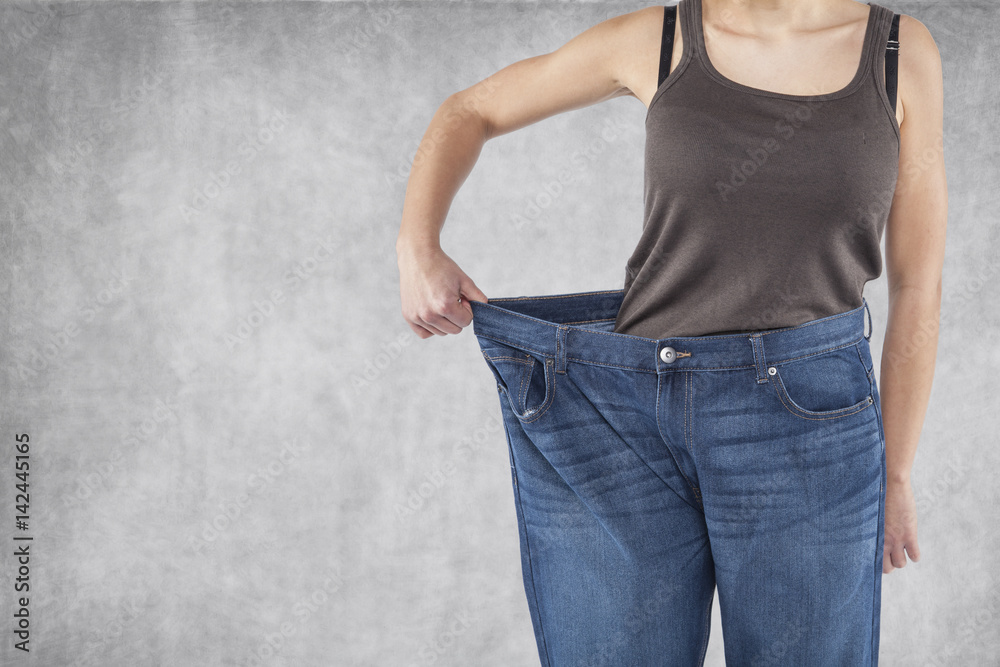 Old pants are too big Stock Photo | Adobe Stock