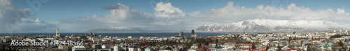 Panorama of Reykjavik skyline showing Hallgrimskirkja church cathedral and the mountains in the background. © L Galbraith