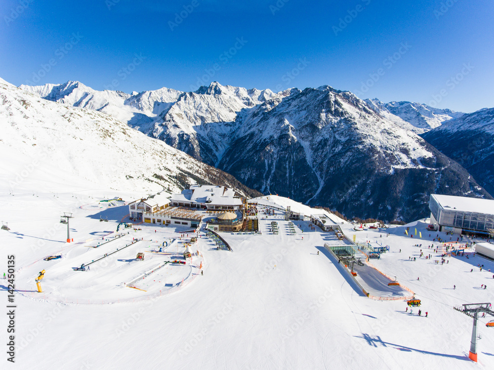 Skiing in the alps. Aerial view over the ski slope
