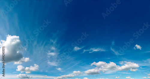Summer blue sky with white air clouds