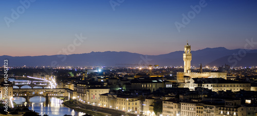 Aerial panorama of Florence city, Arno River and Ponte Vecchio at sunset.