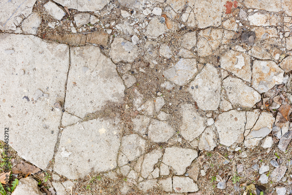 Cracked concrete texture closeup background Cracked concrete texture closeup background