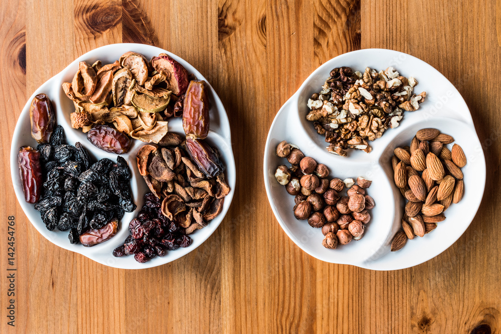 Mix of Dried Fruits on wooden surface. Mix of Dried Fruits on wooden surface.