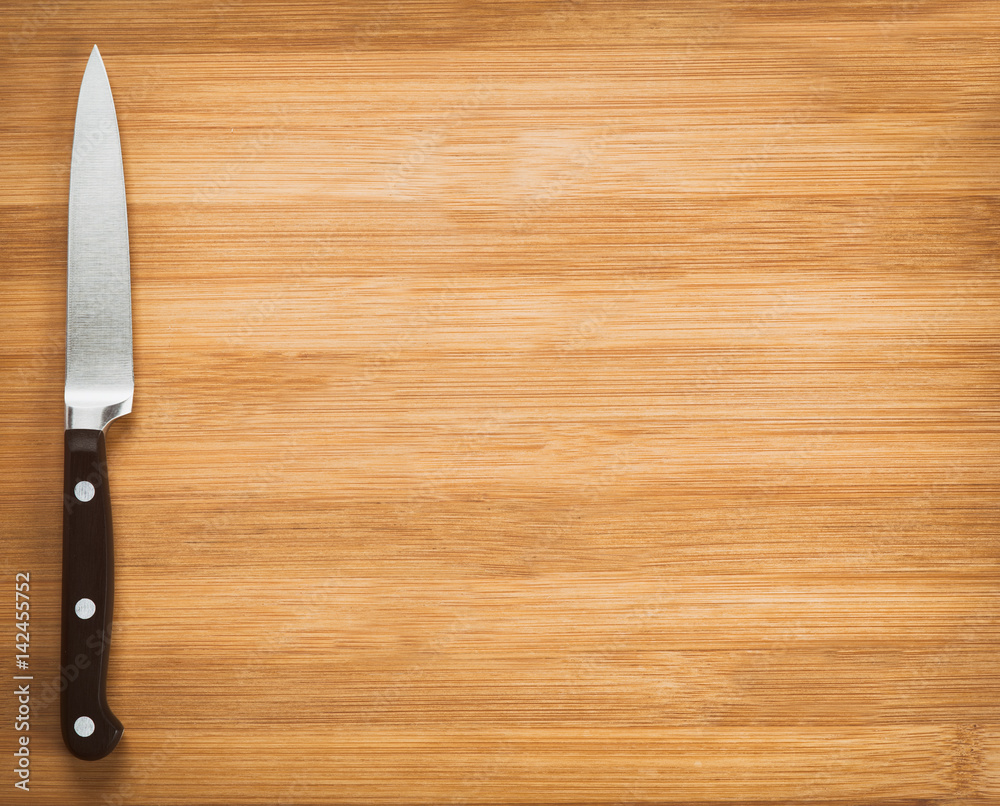 kitchen knife on a wooden background